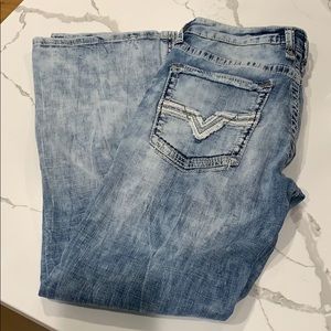 Men's Salvage distress jeans.